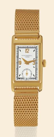 Yellow Gold Art.Deco Ref. 407.Patek Philippe & Co..Geneve, No. 830626, case No. 503509..Ref. 407. Made in 1936..Very fine and rare, 18K yellow gold.rectangular mid-size Art Deco wristwatch.with a 14K yellow gold mesh.bracelet. Accompanied by an Extract.fr