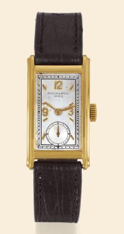 Yellow Gold.Ref. 417.Patek Philippe & Co..Geneve, No. 832269, case No. 505229.Ref. 417. Made in 1938, sold on July 7.1938..Fine, rectangular, curved, 18K yellow.gold gentleman's wristwatch. Accompanied.by the Extract from the Archives.