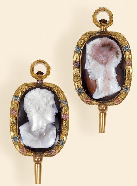 The Emperor Augustus & Minerva.Giuseppe Cerbara, Italian. Made circa 1820..Extremely fine and very rare, double-sided hardstone cameo in a varicolored gold watch key mount.