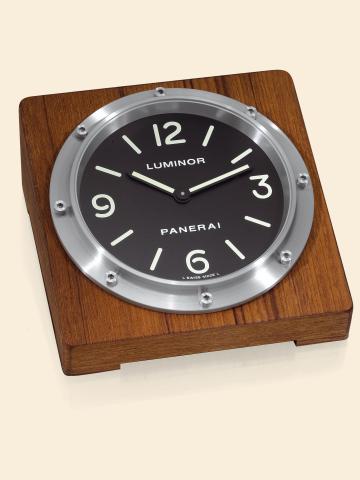 Officine Panerai, Firenze 1860, No. OP6676/.SW0829, Ref. PAM 00254. Made in a limited.edition of 500 examples and sold in.2007..Fine table clock with quartz movement. Accompanied by the.original fitted box and certificate..C. Teak wood base, brushed steel