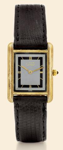 Tank Quartz.Cartier, Tank, Ref. 81006. Made in the 1990s..Fine, rectangular, yellow gold-filled, sterling silver, mid-sized quartz wristwatch. Accompanied by a fitted box..To be sold without reserve