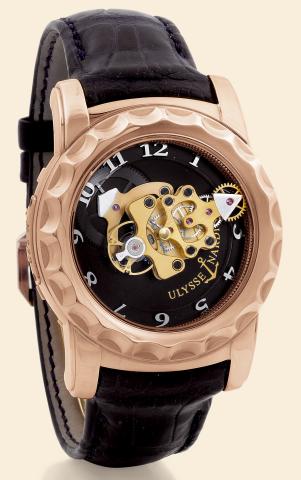 The Freak.Ulysse Nardin, Le Locle, The Freak, No. 339, Ref. 016-88. Made circa 2003..Very fine and highly unusual, 18K pink gold wristwatch with 60-minute revolving.movement, Ludwig Oechslin's dual direct escapement, 7-day power reserve and Ulysse Nardin 