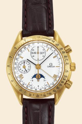 Yellow Gold Triple Date Moon Phase.Omega, Speedmaster Automatic, case.No. 51806898, Ref. BA 1750034. Made.in 1990..Fine, self-winding, 18K yellow gold wristwatch with.round button chronograph, registers and tachometer.24-hour indication, triple date and m