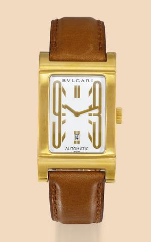 Bulgari, Rettangolo.case No L807, Ref. RT45G..Produced in 2000..Fine, self-winding, water-resistant.18K yellow gold wristwatch with date.and an 18K yellow gold Bulgari deployant.clasp. Accompanied by a certificate and guarantee.To be sold without reserve