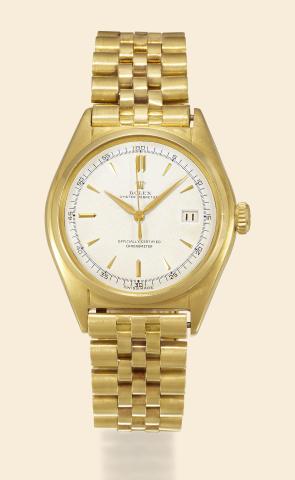 Ref. 5030, Red & Black Date.Rolex, Oyster Perpetual, Officially Certified.Chronometer, Ref. 5030, case No..658577. Made in 1949..Fine and very rare, tonneau-shaped, centre-seconds, selfwinding.water-resistant, 18K yellow gold wristwatch with.date and an 1