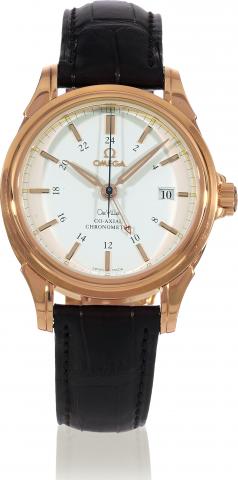 Co-Axial GMT.Omega, De Ville Co-Axial GMT, Automatic Chronometer.movement and case No. 81682557, Ref. No. 46512032..Made circa 2005, sold on February 23, 2007..Fine, two-time zone, center-seconds, self-winding, waterresistant.18K pink gold wristwatch with