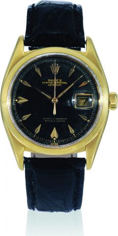 Yellow Gold, Ref. 6604.Rolex, Oyster Perpetual DateJust, Superlative Chronometer.Officially Certified, case No. 283006, Ref. 6604. Made in.1957..Fine, early, tonneau-shaped, center seconds, self-winding.water-resistant, 18K yellow gold wristwatch with dat