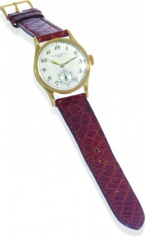 Yellow Gold, Ref. 448.Patek Philippe & Co., Geneve, movement No. 826007, case No. 294755, Ref. 448. Made in 1930, sold on March.10th, 1937..Fine and rare, small 18K yellow gold wristwatch with an 18K yellow gold Patek Philippe buckle. Accompanied by the E
