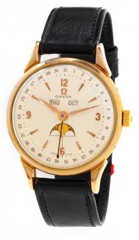Cosmic.Omega, movement No. 112593435, Ref. No. 2486-2..Made circa 1947..Very fine and rare, early, pink gold-plated wristwatch with triple.date, moon phases and a gold-plated Omega buckle..To be sold without reserve