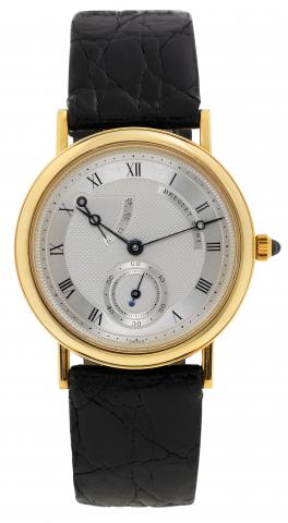 Power Reserve.Breguet, No. 3541, Ref. 3360. Made in the early 2000s..Very fine, 18K yellow gold wristwatch with power reserve and an.18K yellow gold Breguet buckle. Accompanied by a fitted box.