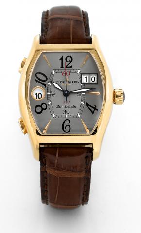 Michelangelo UTC.Ulysse Nardin, Michelangelo UTC, No. 252, Ref. 226-68. Made circa 2005..Fine, tonneau-shaped, curved, self-winding, center seconds, water-resistant, two time zone, 18K yellow gold.wristwatch with large date, 24 hour indication, independen