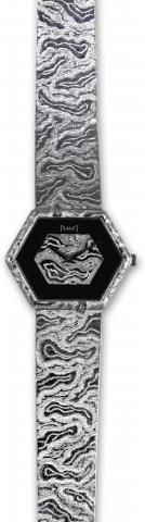 White Gold & Onyx.Piaget, movement No. 7804735, case No. 325001.Ref. 9578A17. Made in the 1970s..Very fine, elegant, hexagonal 18K white gold wristwatch with.white gold and black onyx dial and an integral 18K white gold.Piaget textured bracelet.