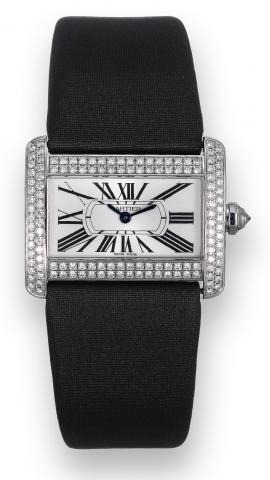 Tank Divan.Cartier, Tank Divan, case.No. 265103CE, Ref. 2613. Made circa.2006..Fine and unusual, horizontal rectangular.and curved, water-resistant, 18K white.gold and diamond-set lady