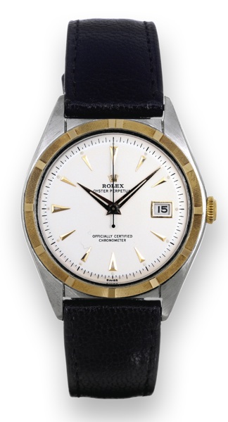 Ref. 5031, Steel & Gold.Rolex, Oyster Perpetual.Officially Certified Chronometer, case.No. 612627, Ref. 5031. Made in 1948..Fine and rare, tonneau-shaped, centerseconds.self-winding, water-resistant.yellow gold and stainless steel wristwatch.with date and