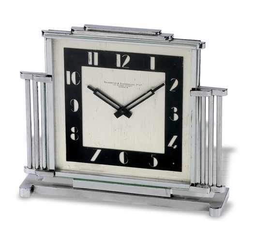 Gold smiths & Silversmiths Co. Art deco.desk clock.French, retailed by Goldsmiths & Silversmiths Co. Ltd. Made.circa 1930..Fine chrome and glass Art deco desk clock..To be sold without reserve