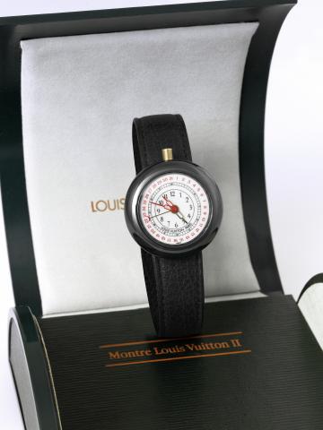 IWC & Louis Vuitton Ceramic Alarm.Louis Vuitton, Paris, Ceramic Alarm, Ref. 3100, case No. 2415540. Made in 1998..Fine, ceramic quartz wristwatch with alarm, date and a gold-plated Louis Vuitton buckle. Accompanied by a fitted box and.certificate.