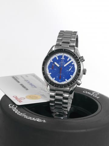 RACING.Omega, Speedmaster, Automatic, case No. 56307657.Ref. 351081. Sold on August 30th, 1999..Fine, asymmetric, self-winding, water-resistant, stainless.steel wristwatch with round button chronograph, registers.tachometer and a stainless steel Omega bra
