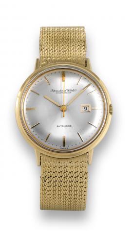 International WatCh & Co..International Watch & Co., (IWC).Schaffhausen, Automatic, movement.No. 1696059, case No. 1700671, Ref..603. Made in the 1960s..Very fine, self-winding (Pellaton system).center seconds, 18K yellow gold.wristwatch with date and an 