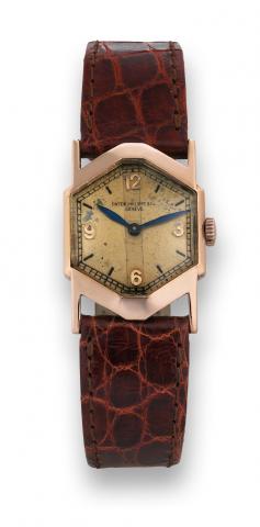 Patek Philippe Ref. 472.Patek Philippe & Co, Geneve, movement No. 813903, case.No. 613200, Ref. 472. Movement made in 1926, encased in.1936 and sold on January 13th, 1937..Very fine and rare, octagonal 18K pink gold wristwatch with.a 18K pink gold Patek P