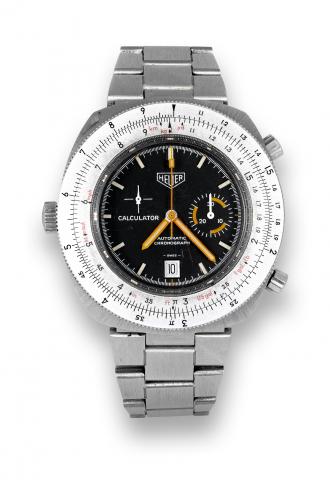 Heuer, Calculator, Automatic Chronograph, Ref..150.633. Made circa 1972..Fine and unusual, oversized, tonneau shaped, water-resistant.self-winding stainless steel wristwatch with round button.chronograph, registers, date, bezel with slide rule, and a.stai