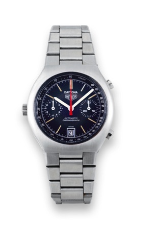 Heuer, Daytona, Automatic, Chronograph.case No. 344877, Ref. 110.203B. Made in the 1970s..Fine, tonneau shaped, water resistant, self-winding.stainless steel wristwatch with registers, date, tachometer.and a stainless steel Heuer bracelet.