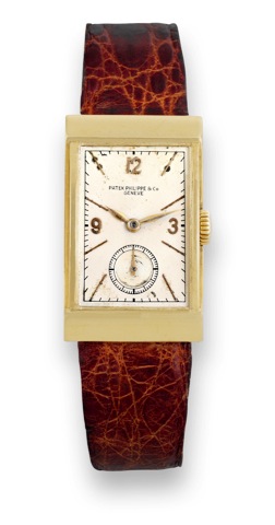 Patek Philippe, Yellow Gold, Ref. 528..Patek Philippe & Co., Geneve, movement No. 833.215.case No. 619.249, Ref. 528. Made in 1939..Very fine and rare, rectangular, curved, 18K yellow gold.wristwatch with a 18K yellow gold Patek Philippe buckle..Accompani