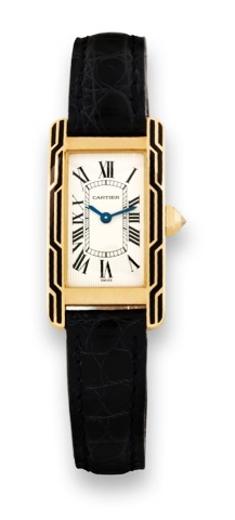 Cartier, Tank Americaine, case No. C146863.Ref. 1710. Made circa 1990..Fine and rare, Art Deco style, rectangular, 18K yellow gold.mid-size quartz wristwatch with an 18K yellow gold Cartier.buckle. Accompanied by fitted box.