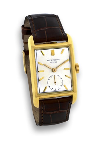 Patek Philippe - Ref. 2434 - Yellow Gold.Patek Philippe & Cie, Geneve, No. 973908, case No. 666255.Ref. 2434. Made circa 1951..Fine and rare, rectangular, 18K yellow wristwatch.