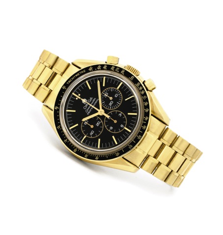 OMEGA - YELLOW GOLD - SPEEDMASTER PROFESSIONAL - LIMITED EDITION.Omega, Speedmaster Professional, Ref. 1450052, No. 741/999, case No. 49309915, movement.No.48309915, Produced in a limited edition of 999 examples circa 2000..Very fine and rare, water-resis