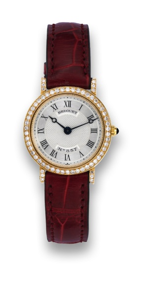 BREGUET CLASSIQUE.Breguet, Classique, movement No. 11804, case No. 438.Ref. 857. Sold On December 18th, 1993..Very fine and elegant, 18K yellow gold and diamond.lady