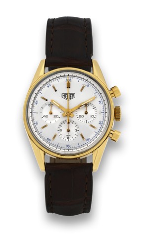 HEUER CARRERA GOLD RE-EDITION.Heuer Carrera Chronograph, Carrera, 1964 re-edition.movement No. 4520072, case No. 1259, Ref. CS3140. Made.in a numbered series circa 2000..Fine, water resistant, 18K yellow gold wristwatch with round.button chronograph, regi