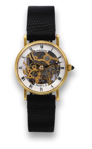 BREGUET SKELETON RETAILED BY TIFFANY & CO..Breguet, Skeleton, case No. 2215, retailed by Tiffany & Co..Made in the 1990's..Fine and elegant, thin, skeletonized, 18K yellow gold ladies.wristwatch with an 18K yellow gold buckle.