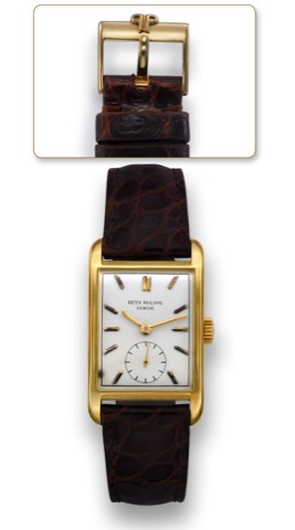 PATEK PHILIPPE REF. 2434 YELLOW GOLD.Patek Philippe & Cie, Geneve, No. 976329, case No. 682549.Ref. 2434. Made circa 1954..Fine and rare rectangular 18k yellow gold wristwatch with 18k.yellow gold Patek Philippe buckle.