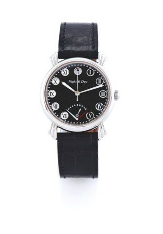 VINCENT CALABRESE, NIGHT AND DAY.Vincent Calabrese, Swiss, Night & Day, No. 650. Made circa 2006..Fine and unusual, self-winding, water-resistant, center-seconds, stainless steel wristwatch.with night and day indication and a stainless steel hermes deploy