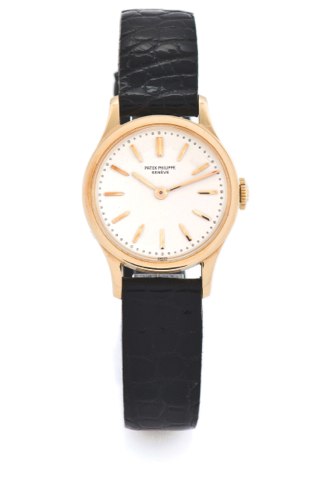 PATEK PHILIPPE REF. 3148 CALATRAVA PINK GOLD.Patek Philippe & Cie, Genève, Calatrava, No. 854803, case No..305164, Ref. 3148. Made circa 1955..Elegant and very rare 18K pink gold wristwatch with an 18K.pink gold Patek Philippe buckle.