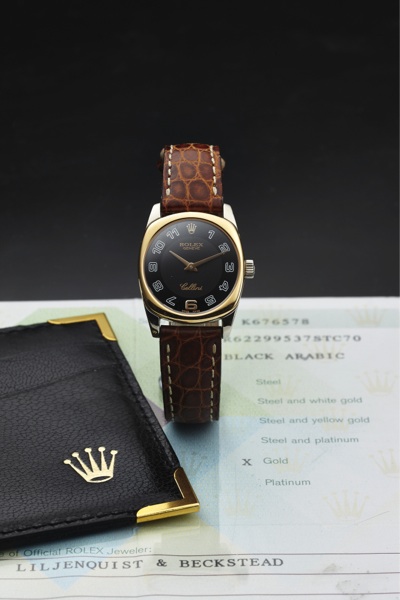 ROLEX CELLINI REF. 6229.QUARTZ PINK & WHITE GOLD.Rolex, Genève, Cellini, case No. K676578, Ref. 6229. Made circa 2007..Fine, tonneau-shaped, 18K pink and white gold quartz wristwatch with an 18K white gold Rolex buckle. Accompanied by a service