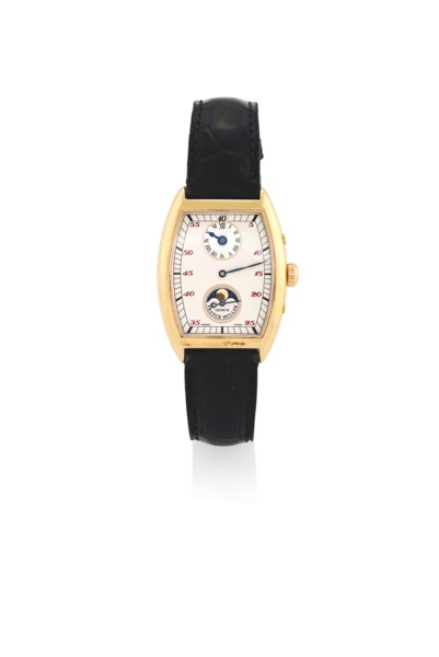 FRANCK MULLER YELLOW GOLD JUMP-HOUR & MOON PHASE.Franck Muller, Genève, Cintrée Curvex, No. 16, Ref. 7500 DS L. Made in a limited.series circa 2000..Very fine, tonneau-shaped, water-resistant, jump-hour, two-time-zone, 18K yellow.gold wristwatc