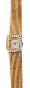 PATEK PHILIPPE REF. 3367/1 DIAMOND & YELLOW GOLD. Patek Philippe, Geneve, No.1249251, case No.2662929, Ref.3367/1.. Made in the later 1980’s.. Very fine and elegant, 18K yellow gold, diamonds lady’s wristwatch with. concealed dial and 18K yellow gold Pate