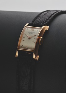 PATEK PHILIPPE REF. 2295. MINI PAGODA PINK GOLD. Patek Philippe & Cie, Genève, No. 946099, case No.. 673023, Ref. 2295. Made circa 1950.. Fine and very rare, rectangular domed, flared, “Pagoda”. shaped, 18K pink gold lady’s wristwatch with an 18K pink. go