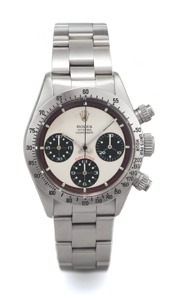 ROLEX REF. 6265 PAUL NEWMAN sTEEL. Rolex, “Oyster Cosmograph”, case No. 3055488, Ref. 6265, case back 6262/6265.. Made circa 1971.. Very fine and rare, water-resistant, stainless steel wristwatch with steel bezel, roundbutton. chronograph, registers, tach