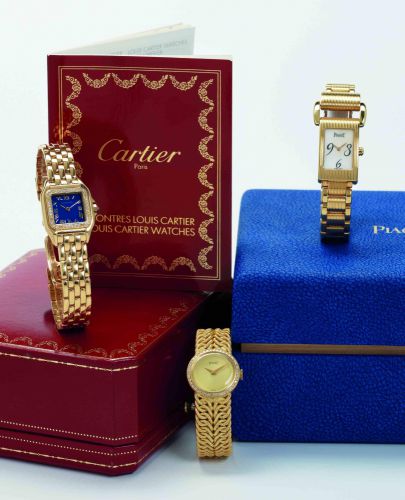Cartier. A fine 18ct gold and diamond set lady's quartz bracelet watch