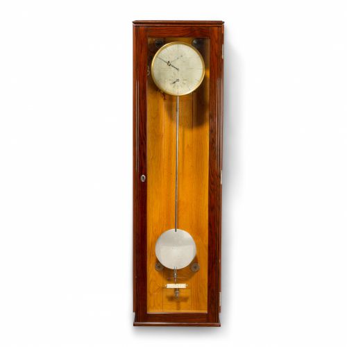 A fine oak wall regulator with electric remontoire