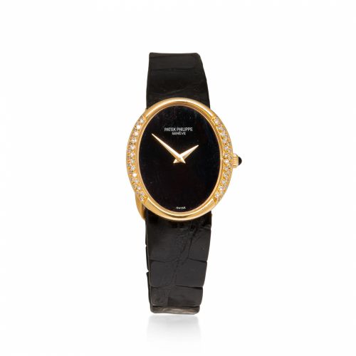 Patek Philippe. An 18K gold and diamond lady's wristwatch