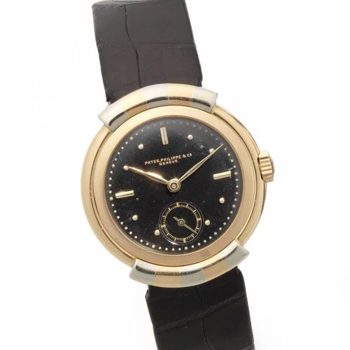 Patek Philippe. A fine and very rare 18ct rose and white gold manual wind wristwatch with hooded lugs and black dial with Patek Philippe Extract from Archives