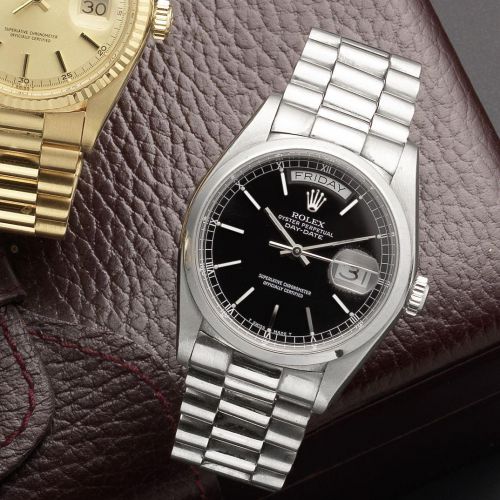Rolex. A fine and rare platinum automatic calendar bracelet watch