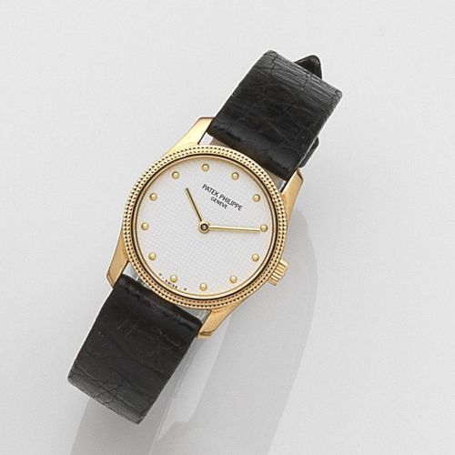 Patek Philippe. A lady's 18ct gold manual wind wristwatch