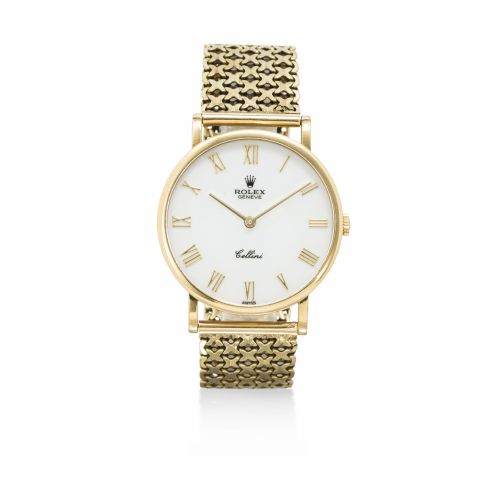 Rolex. An 18K gold wristwatch