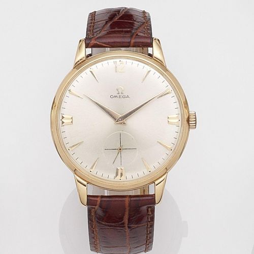 Omega. An 18k gold manual wind wristwatch