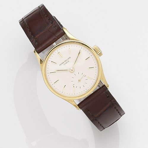 Patek Philippe. A lady's 18k gold manual wind wristwatch