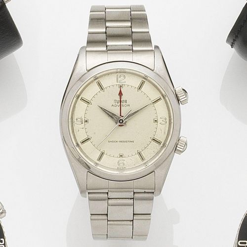 Tudor. A stainless steel manual wind alarm bracelet watch